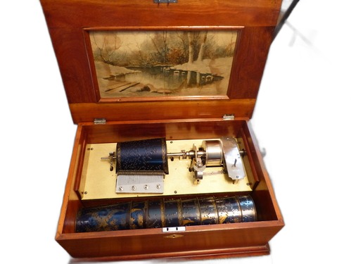 Capital cuff music box